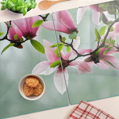 Szklana deska do krojenia Kwiaty magnolii na tle zieleni