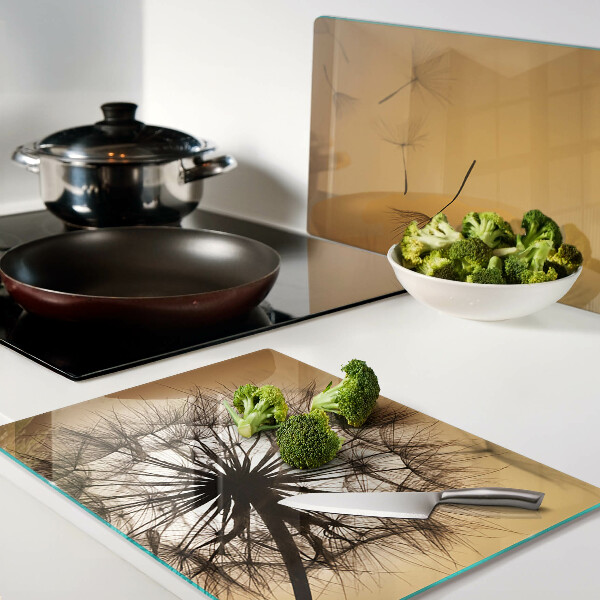 Deska kuchenna szklana Dmuchawce na tle zachodu słońca