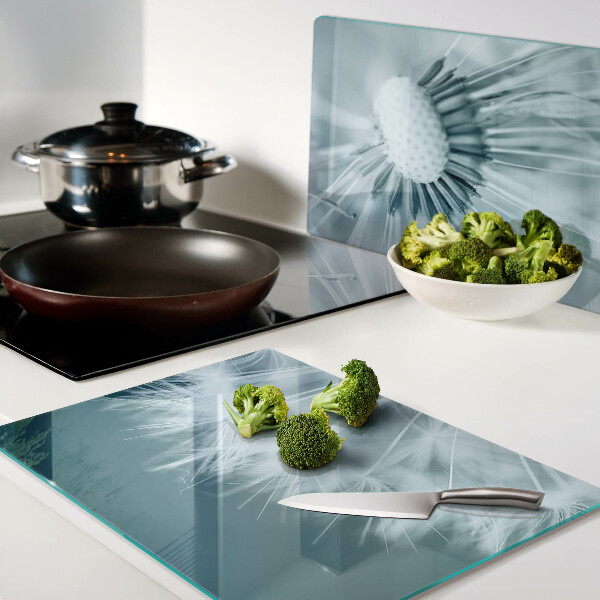 Snijplanken van glas Paardenbloemen tegen de hemel