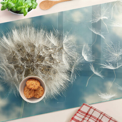 Snijplanken van glas Paardenbloemen tegen de hemel