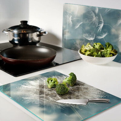 Snijplanken van glas Paardenbloemen tegen de hemel