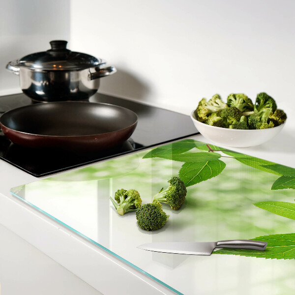 Szklana deska kuchenna Liście na tle rozmytej zieleni