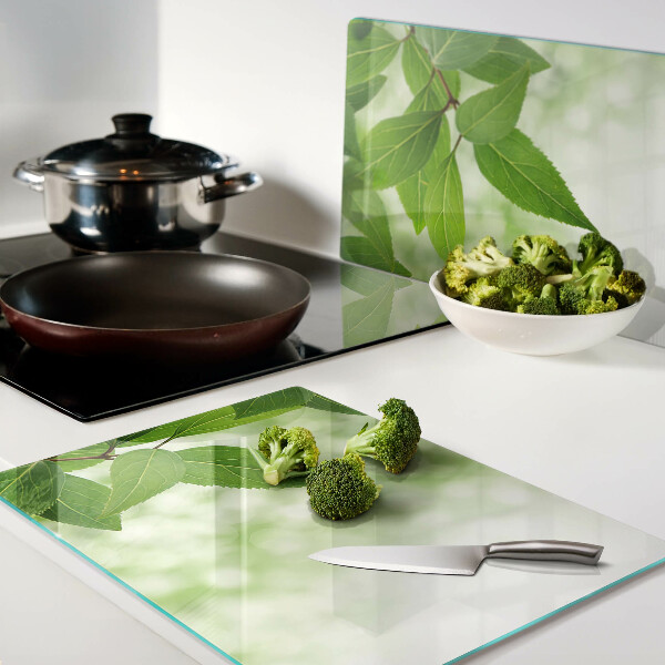 Szklana deska kuchenna Liście na tle rozmytej zieleni