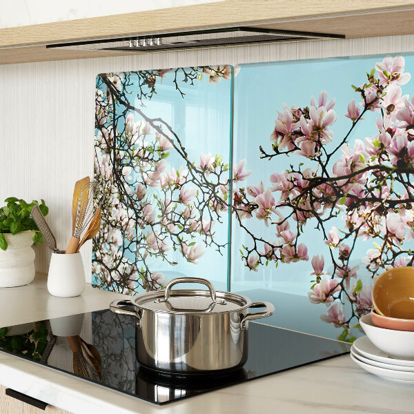 Deska kuchenna szklana Kwiaty magnolii na niebieskim tle