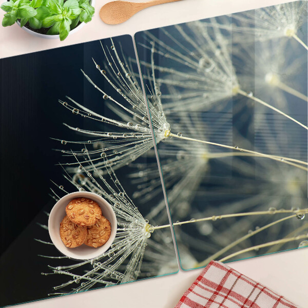 Snijplanken glas Paardenbloemen met waterdruppels