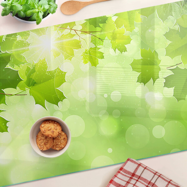 Szklana deska do krojenia Liście w promieniach słońca