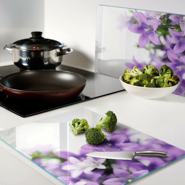 Szklana deska do krojenia Fioletowe kwiaty w tle