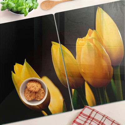 Snijplanken glas Gele tulpen op een zwarte achtergrond