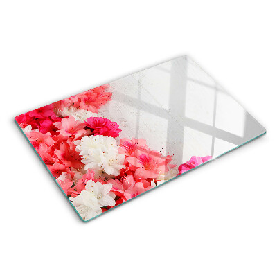 Snijplanken van glas Bloemen in roze en witte tinten.