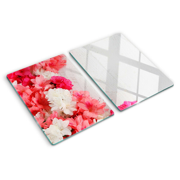 Snijplanken van glas Bloemen in roze en witte tinten.