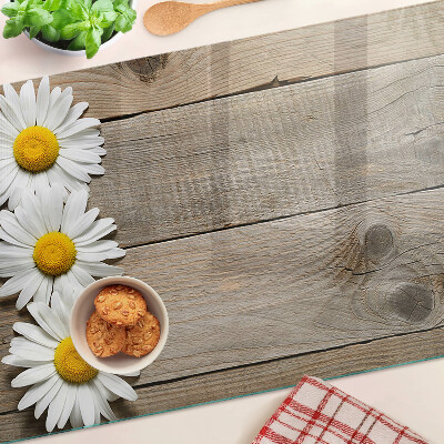 Snijplanken glas Bloemen op een houten achtergrond