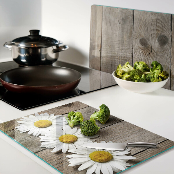 Snijplanken glas Bloemen op een houten achtergrond