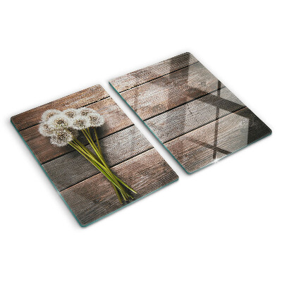 Szklana deska kuchenna Kwiaty dmuchawce na drewnianym tle