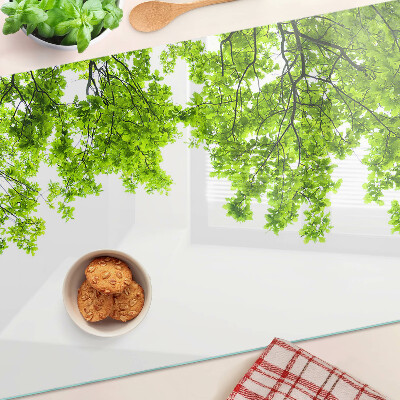 Szklana deska kuchenna Zielone liście na tle nieba