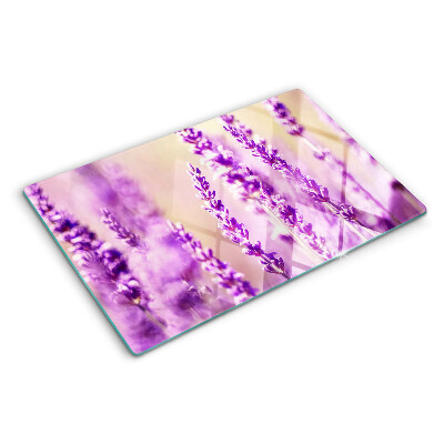 Glazen snijplanken Lavendelbloemen op een achtergrond met kleurverloop