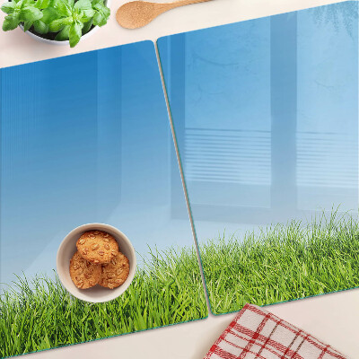 Snijplanken glas Groene weide onder een blauwe hemel