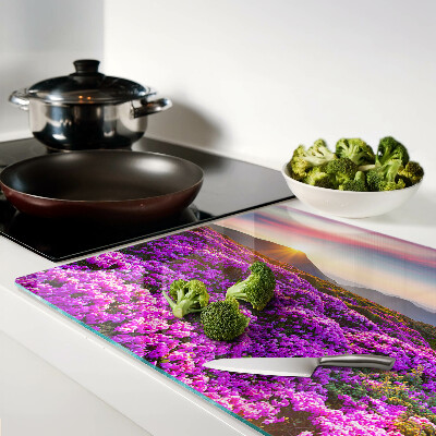 Deska kuchenna szklana Kwiatowy krajobraz w zachodzie słońca