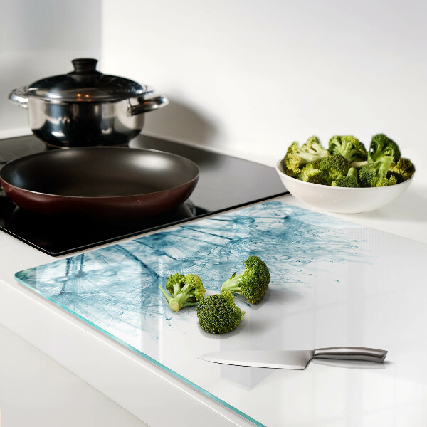 Snijplanken glas Paardenbloemen met waterdruppels