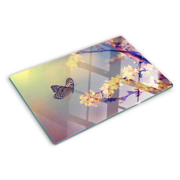 Glazen snijplanken Vlindermotief op een bloemenachtergrond