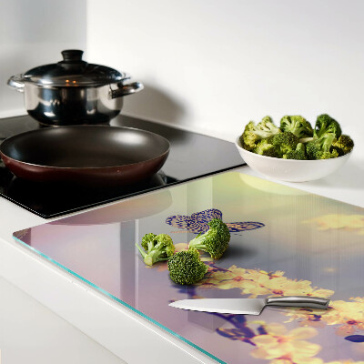 Szklana deska kuchenna Motyw motyla na tle kwiatów