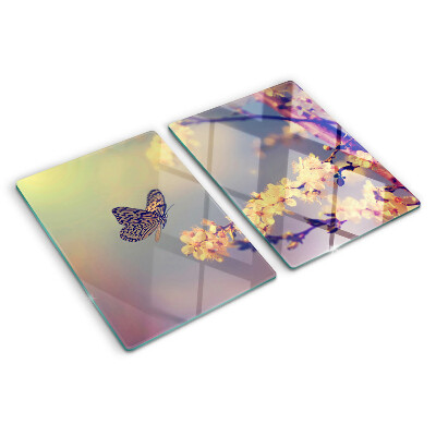 Glazen snijplanken Vlindermotief op een bloemenachtergrond