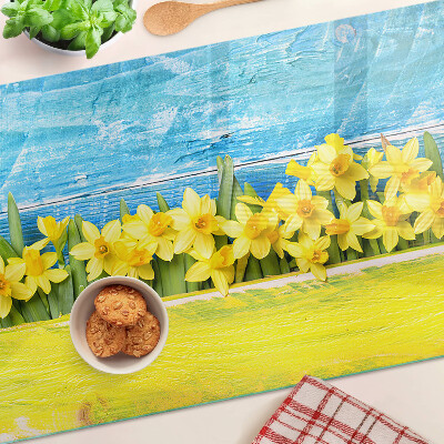 Szklana deska kuchenna Kwiaty żonkili na tle nieba