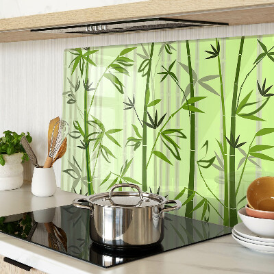 Szklana deska do krojenia Bamboo on green background