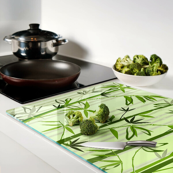 Snijplanken glas Bamboe op een groene achtergrond