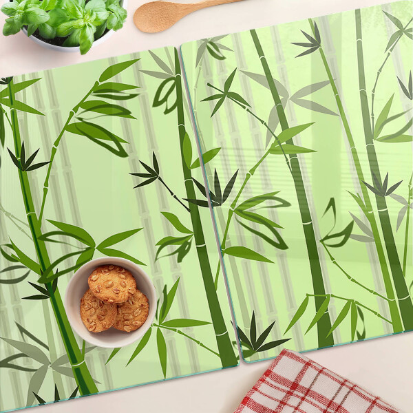 Szklana deska do krojenia Bamboo on green background