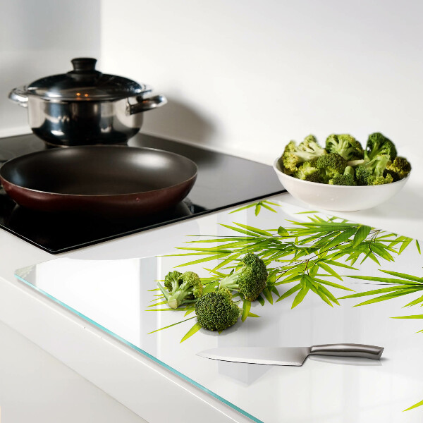 Szklana deska kuchenna Liście bambusa na tle okna