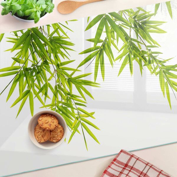 Szklana deska kuchenna Liście bambusa na tle okna