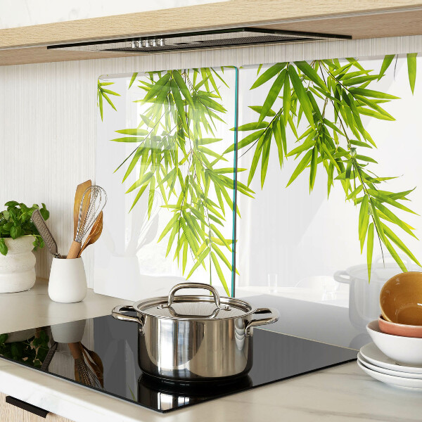 Szklana deska kuchenna Liście bambusa na tle okna