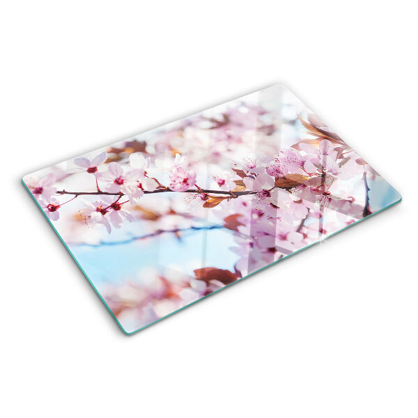Deska kuchenna szklana Kwiaty wiśni na niebieskim tle
