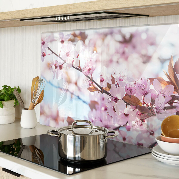 Deska kuchenna szklana Kwiaty wiśni na niebieskim tle