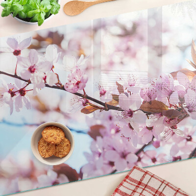 Deska kuchenna szklana Kwiaty wiśni na niebieskim tle