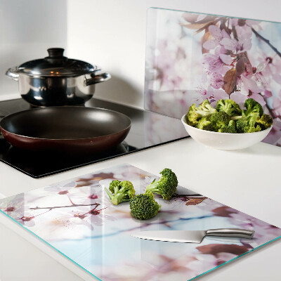 Deska kuchenna szklana Kwiaty wiśni na niebieskim tle