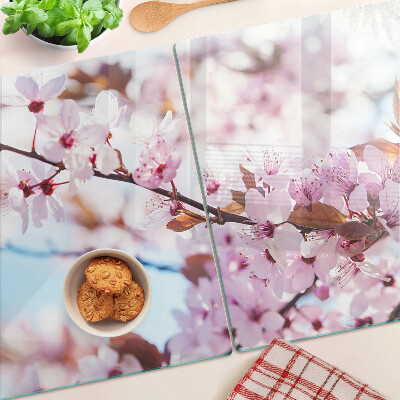 Deska kuchenna szklana Kwiaty wiśni na niebieskim tle