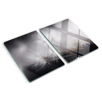 Szklana deska kuchenna Puszyste dmuchawce na tle okna