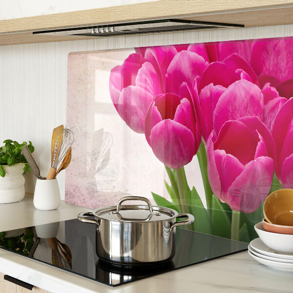 Glazen snijplanken Tulpenbloemen op een roze achtergrond