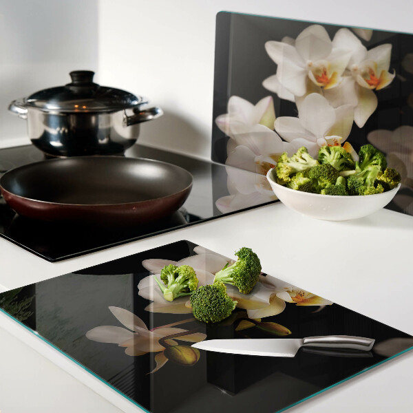 Deska kuchenna szklana Orchidee na czarnym tle