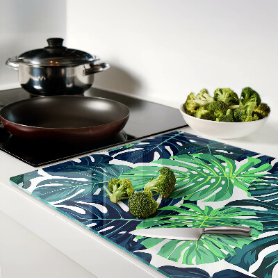 Szklana deska do krojenia Liście monstery na tle tropikalnym