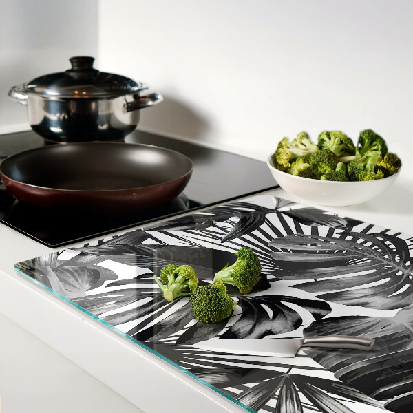 Szklana deska kuchenna Liście tropikalne w czerni i bieli