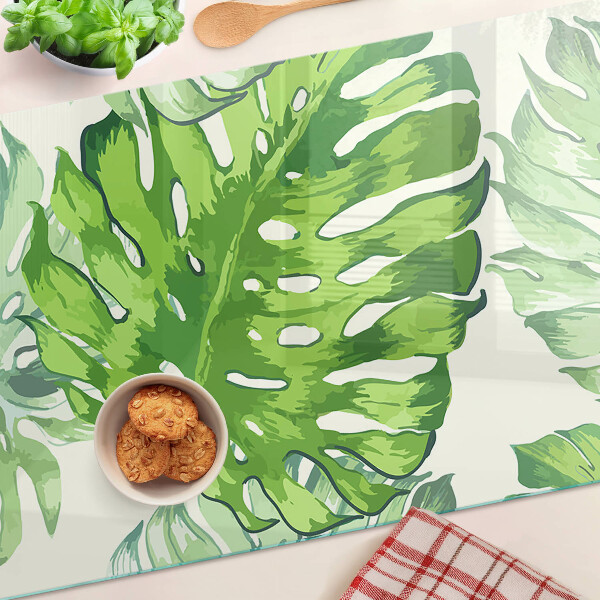 Deska kuchenna szklana Liście monstery na jasnym tle