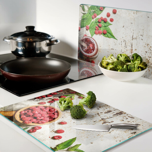 Snijplanken van glas Frambozen en bladeren