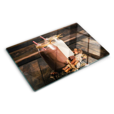 Glazen snijplanken Potten met drankjes op een houten achtergrond