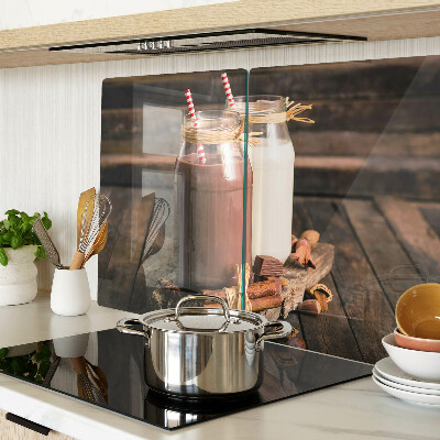 Szklana deska kuchenna Słoiki z napojami na drewnianym tle