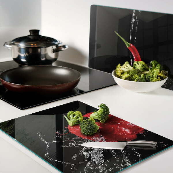 Snijplanken glas Rode paprika in water