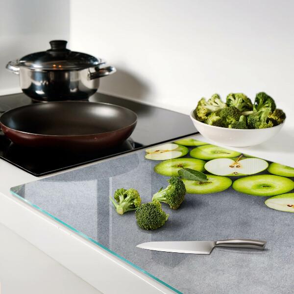 Szklana deska kuchenna Zielone jabłka na szarej powierzchni