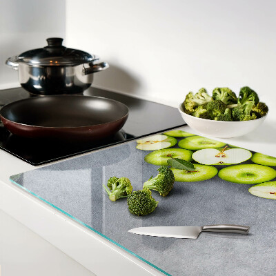 Szklana deska kuchenna Zielone jabłka na szarej powierzchni