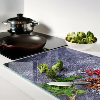 Deska kuchenna szklana Zioła i przyprawy na tle kamienia